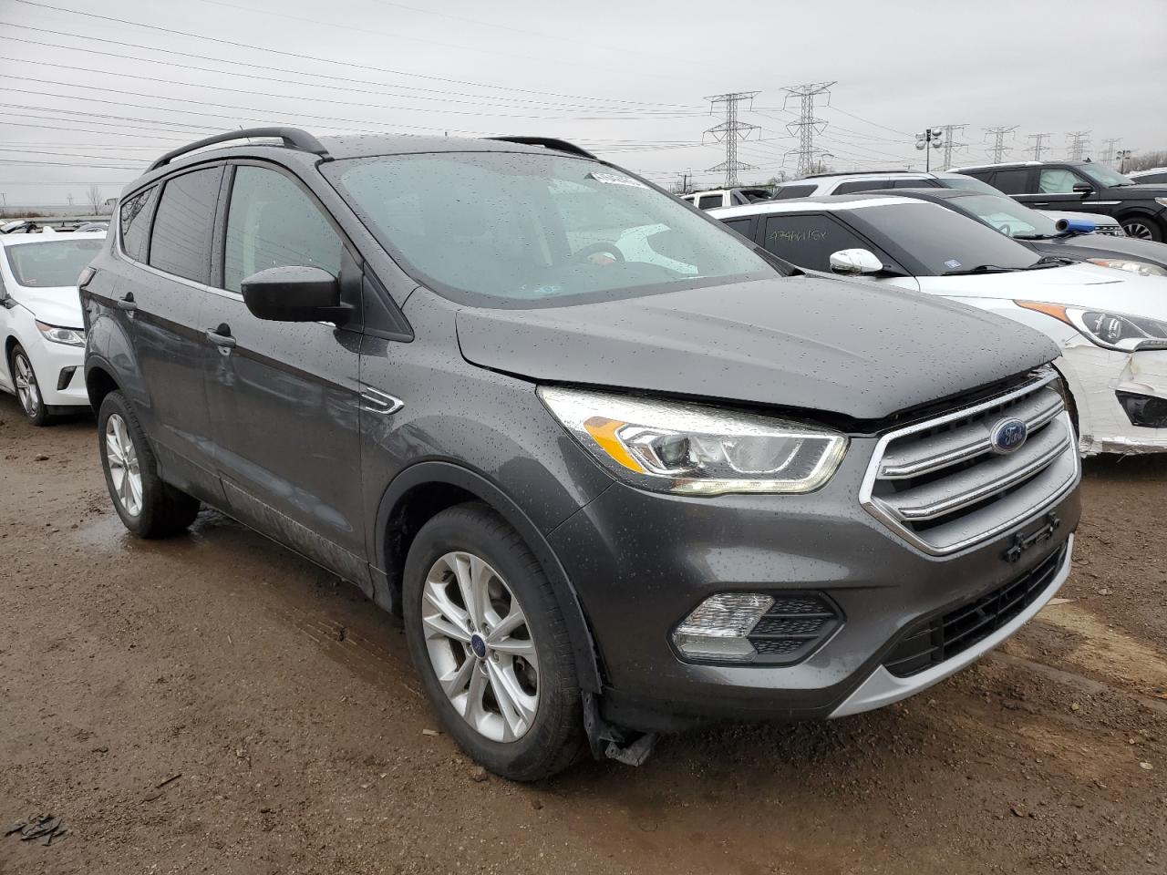 2017 Ford Escape VIN 1FMCU9GD8HUD09780 Copart auction photo, water/flood / minor dent/scratches damage thumbnail 4