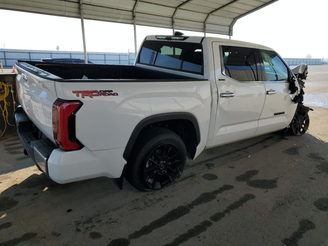 2022 Toyota Tundra VIN 5TFJA5ABXNX010225 Copart auction photo, front end / side damage thumbnail 3