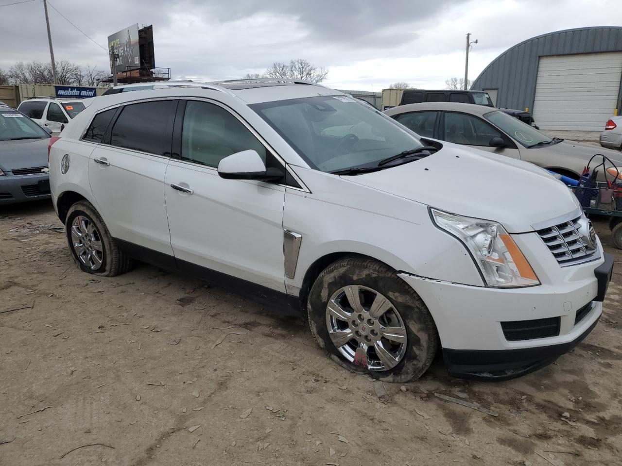 2015 Cadillac SRX VIN 3GYFNBE36FS599993 Copart auction photo, front end damage thumbnail 4