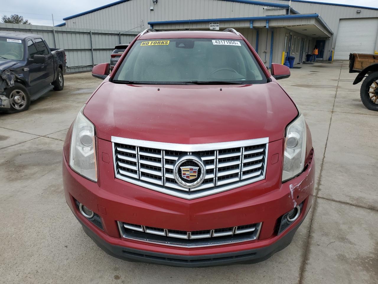2014 Cadillac SRX VIN 3GYFNDE30ES551481 Copart auction photo, front end damage thumbnail 5