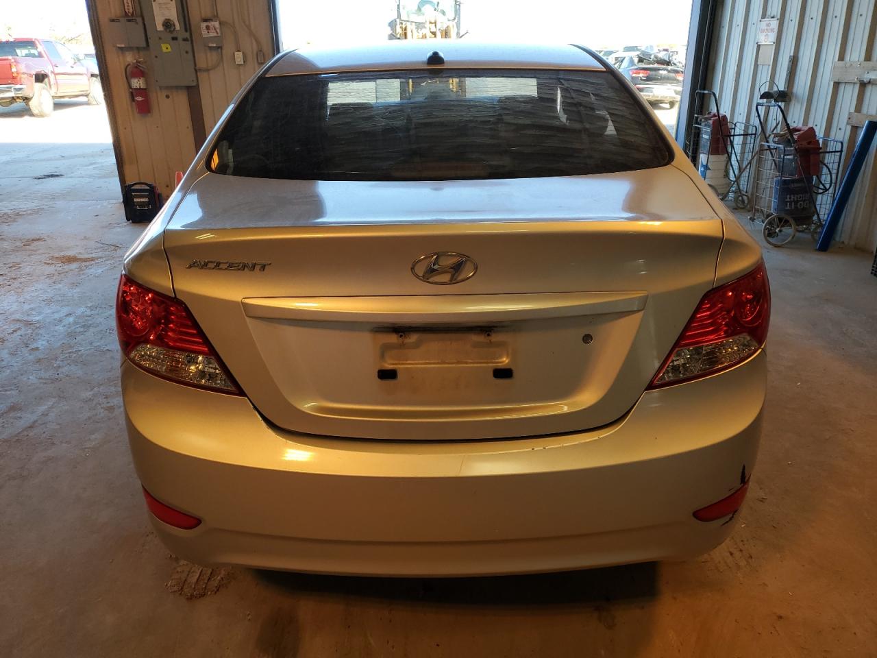 2014 Hyundai Accent VIN KMHCU4AE0EU762064 Copart auction photo, front end / hail damage thumbnail 6
