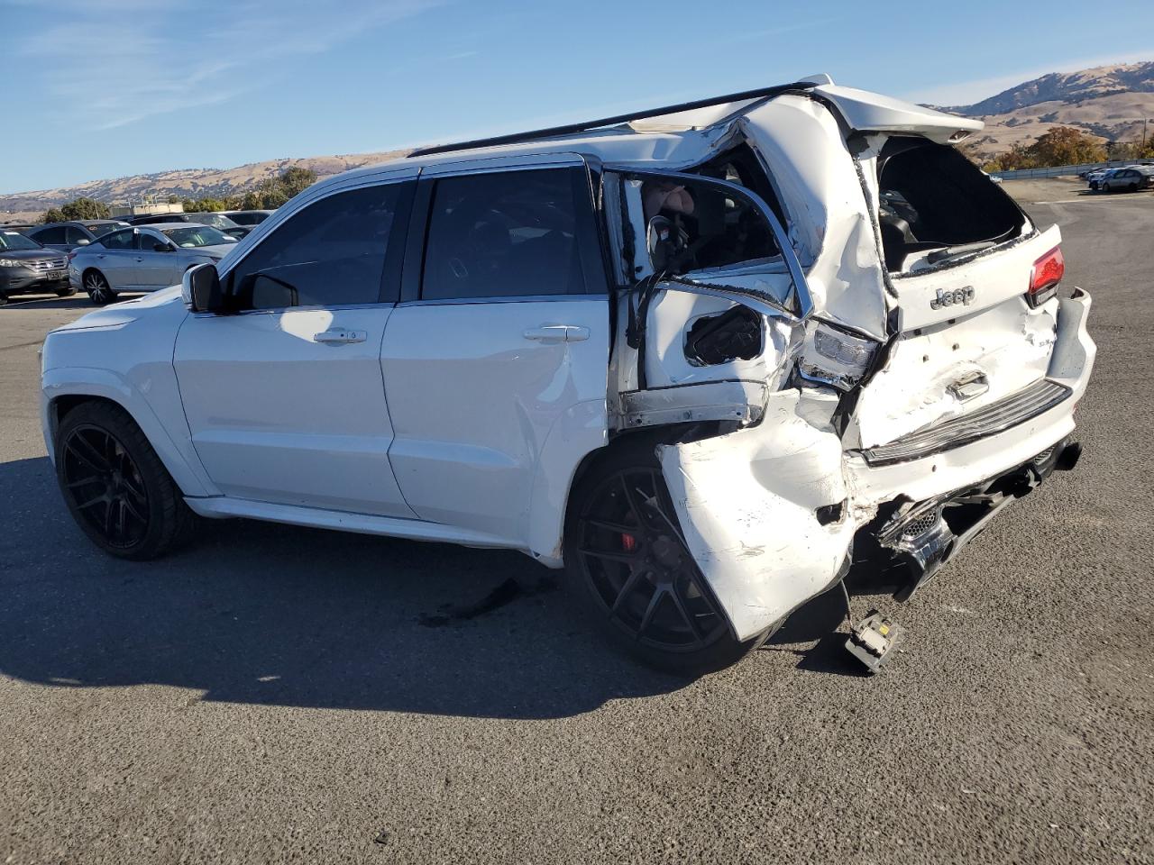 2015 Jeep Grand Cherokee VIN 1C4RJFDJ4FC213146 Copart auction photo, rear end / side damage thumbnail 2