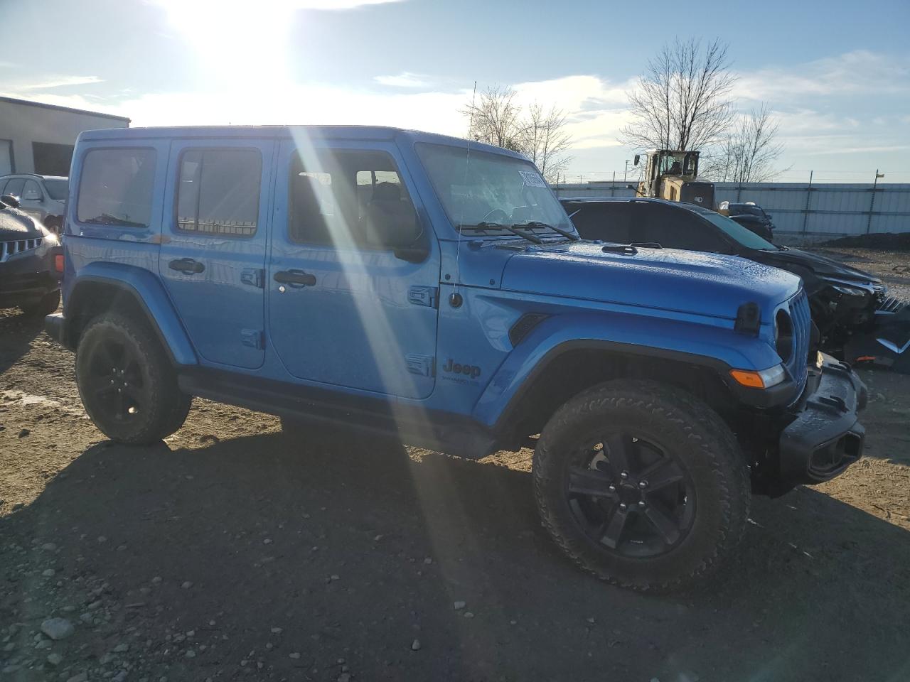2021 Jeep Wrangler VIN 1C4HJXEG5MW729998 Copart auction photo, side damage thumbnail 4