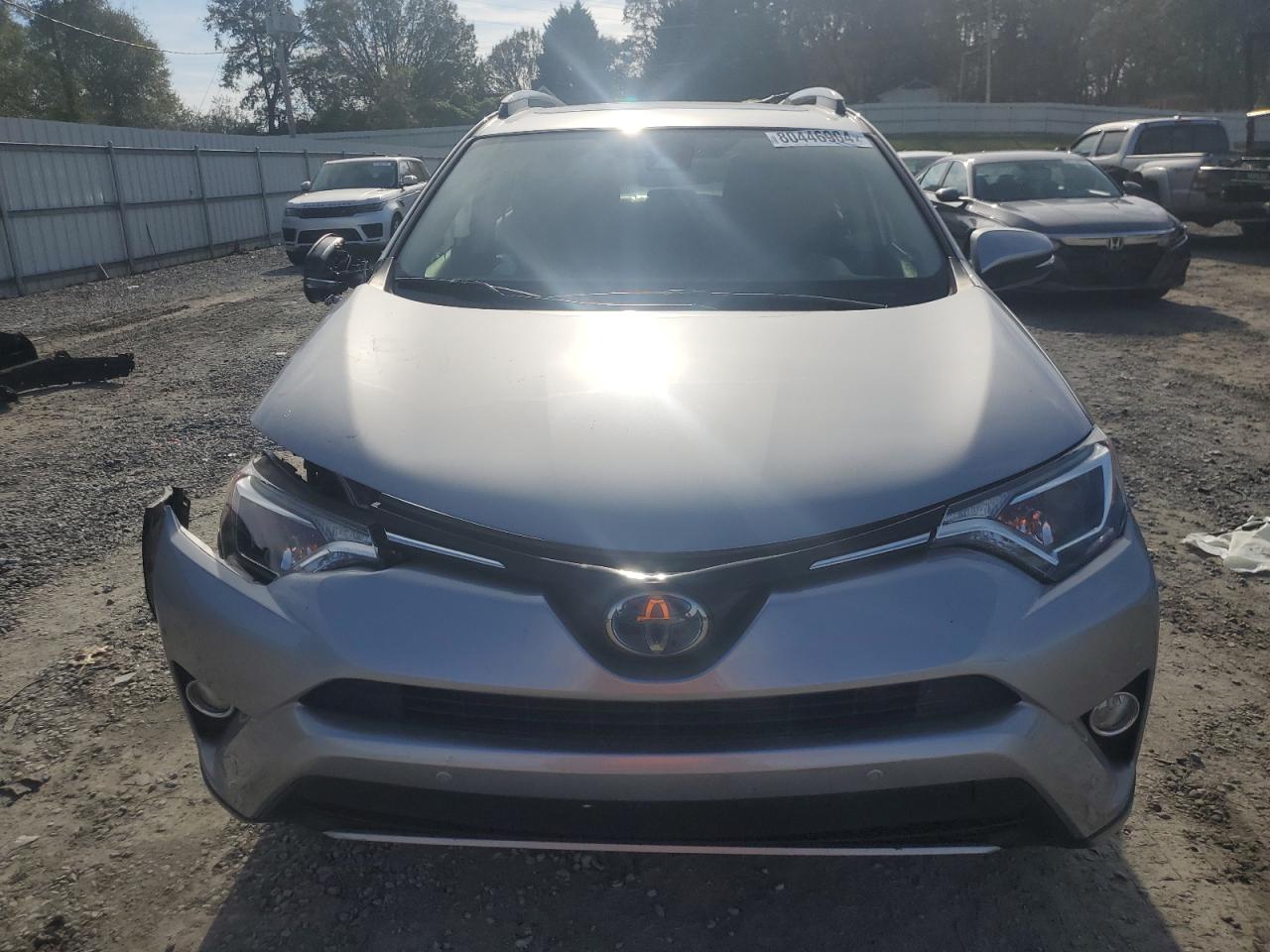 2018 Toyota RAV 4 VIN JTMRJREV8JD239853 Copart auction photo, front end / side damage thumbnail 5