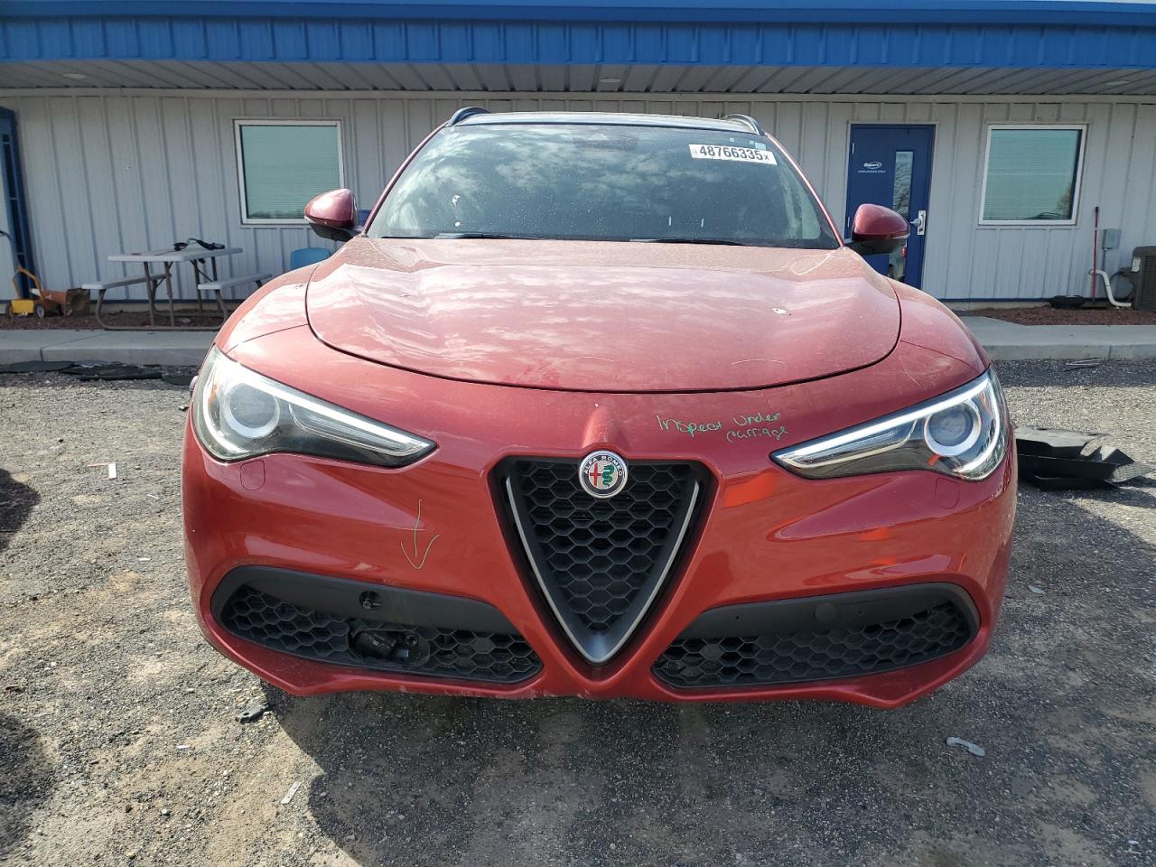 2018 Alfa Romeo Stelvio VIN ZASFAKNN4J7B75102 Copart auction photo, undercarriage / minor dent/scratches damage thumbnail 5