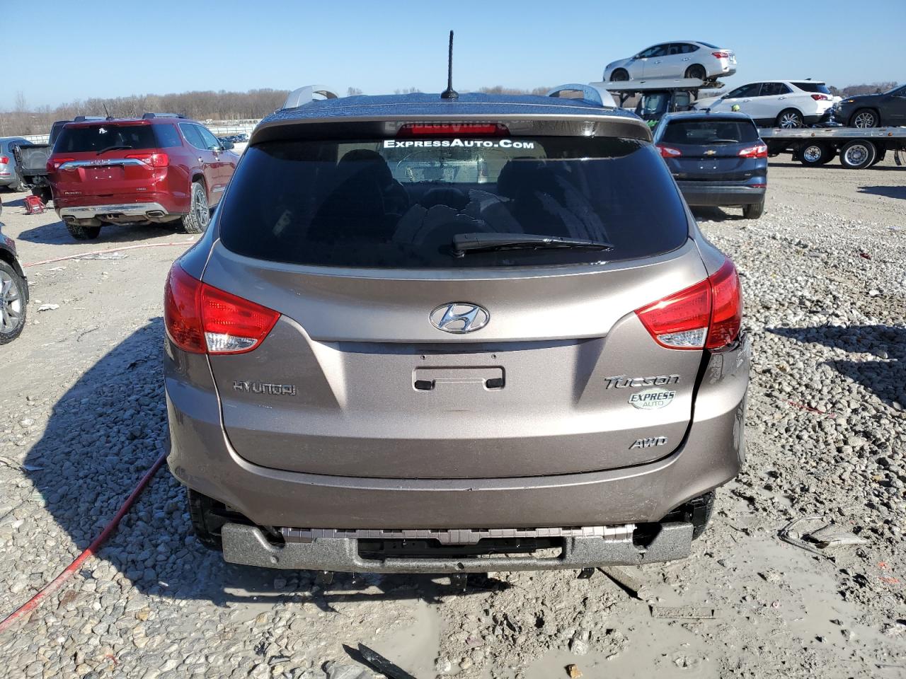 2010 Hyundai Tucson VIN KM8JUCAC2AU110797 Copart auction photo, rear end damage thumbnail 6