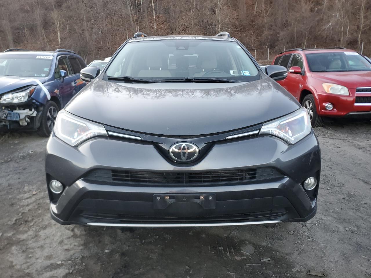 2018 Toyota RAV 4 VIN JTMRFREV6JJ738024 Copart auction photo, rear end / minor dent/scratches damage thumbnail 5