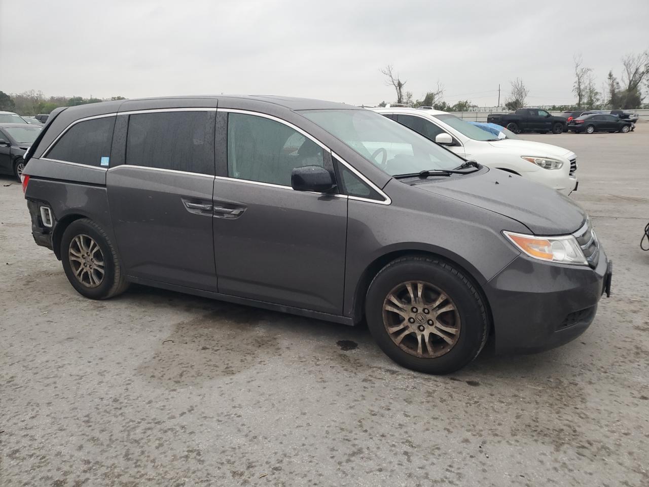 2012 Honda Odyssey VIN 5FNRL5H67CB115186 Copart auction photo, rear end / minor dent/scratches damage thumbnail 4