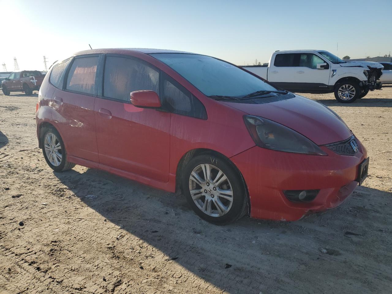2009 Honda Fit VIN JHMGE88459S036434 Copart auction photo, side / minor dent/scratches damage thumbnail 4