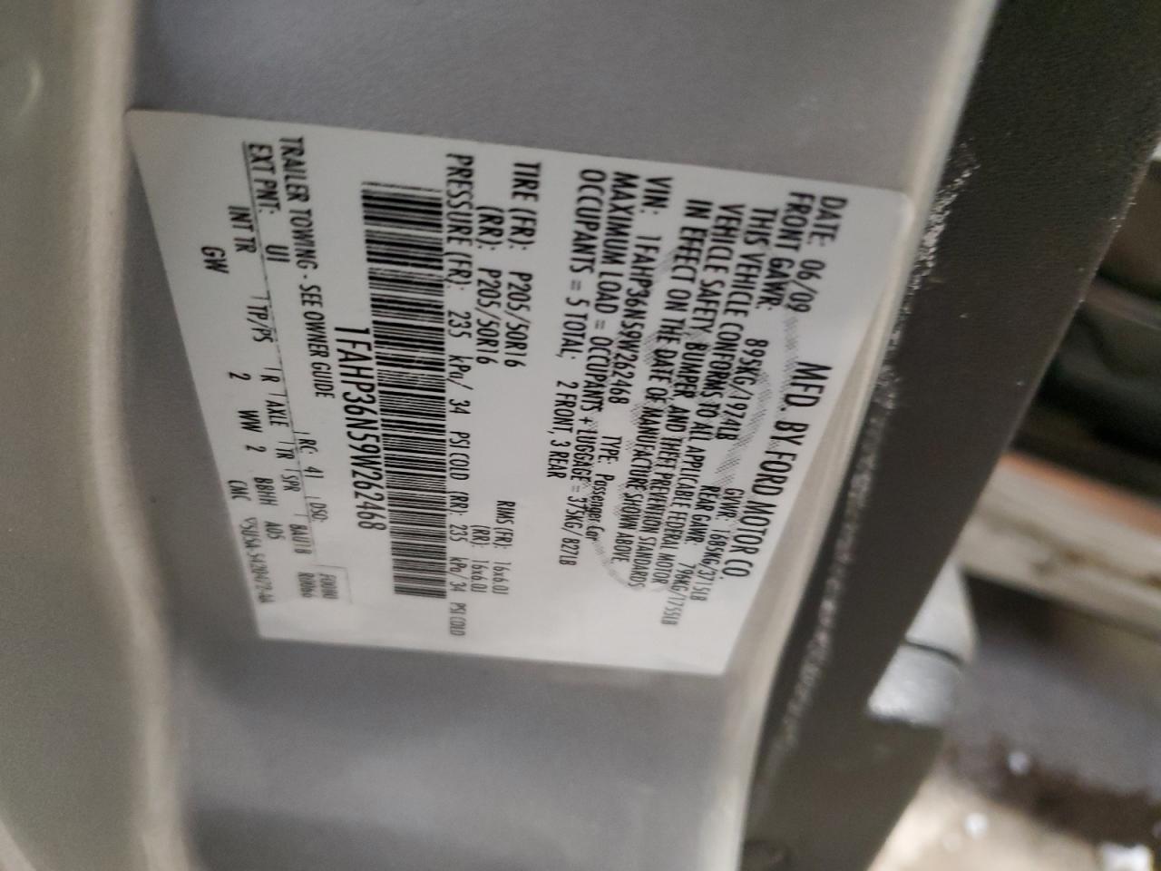 2009 Ford Focus VIN 1FAHP36N59W262468 Copart auction photo, side / minor dent/scratches damage thumbnail 14