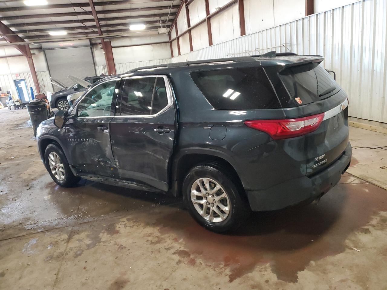 2021 Chevrolet Traverse VIN 1GNERGKW7MJ209216 Copart auction photo, side damage thumbnail 2