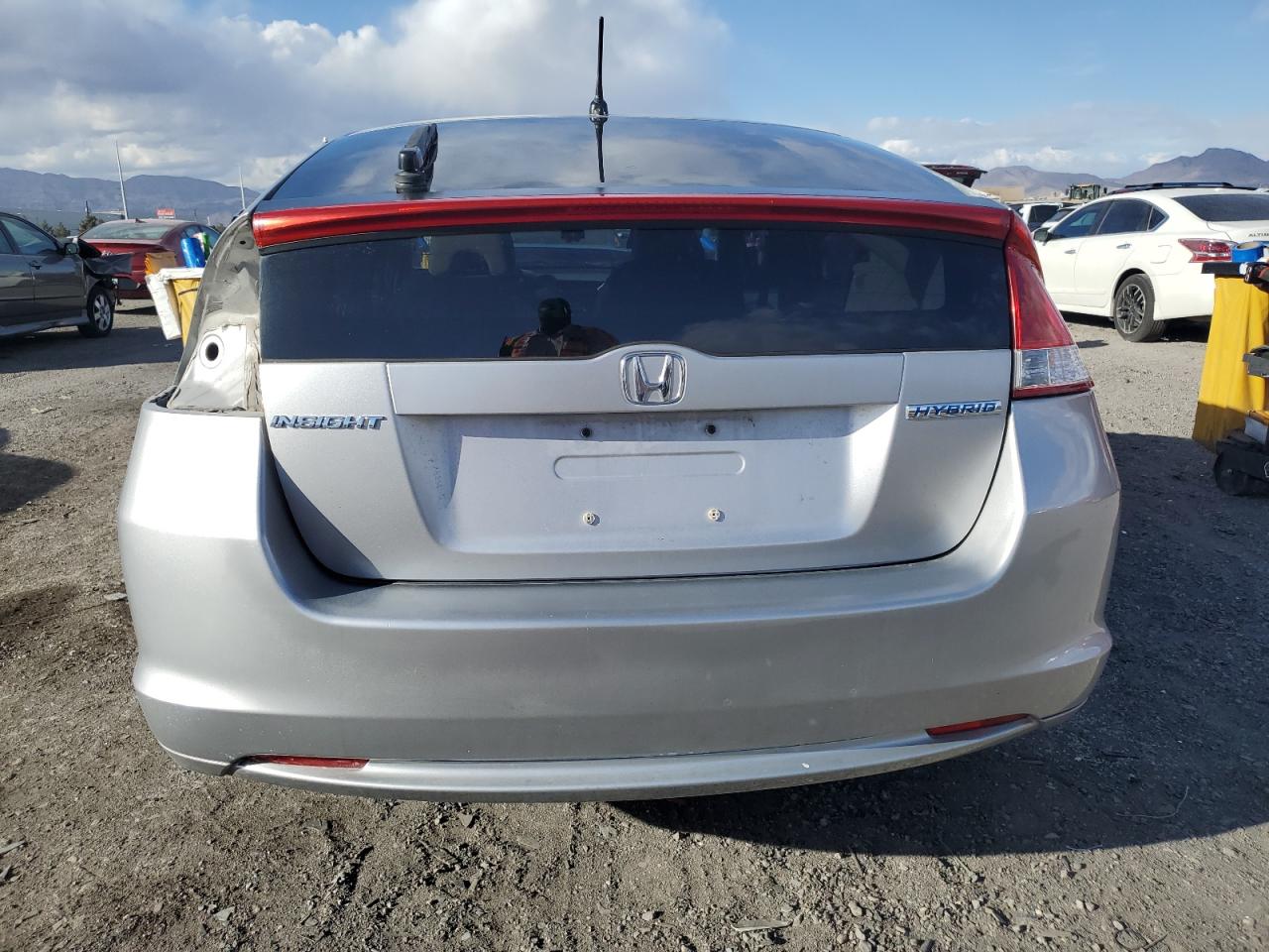 2010 Honda Insight VIN JHMZE2H77AS029473 Copart auction photo, side / rear end damage thumbnail 6