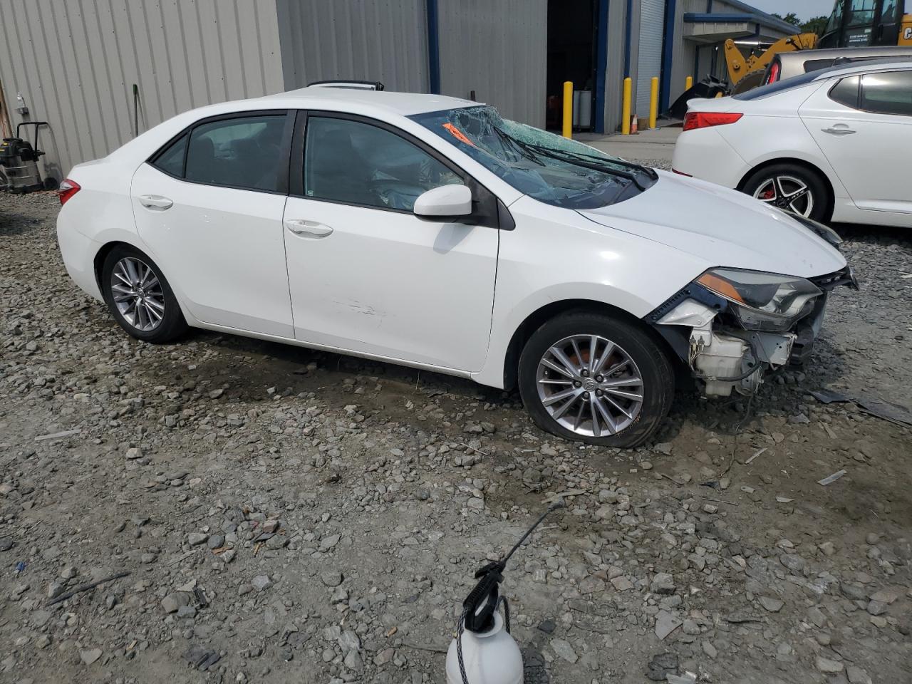 2015 Toyota Corolla VIN 2T1BURHE6FC369672 Copart auction photo, side / all over damage thumbnail 4