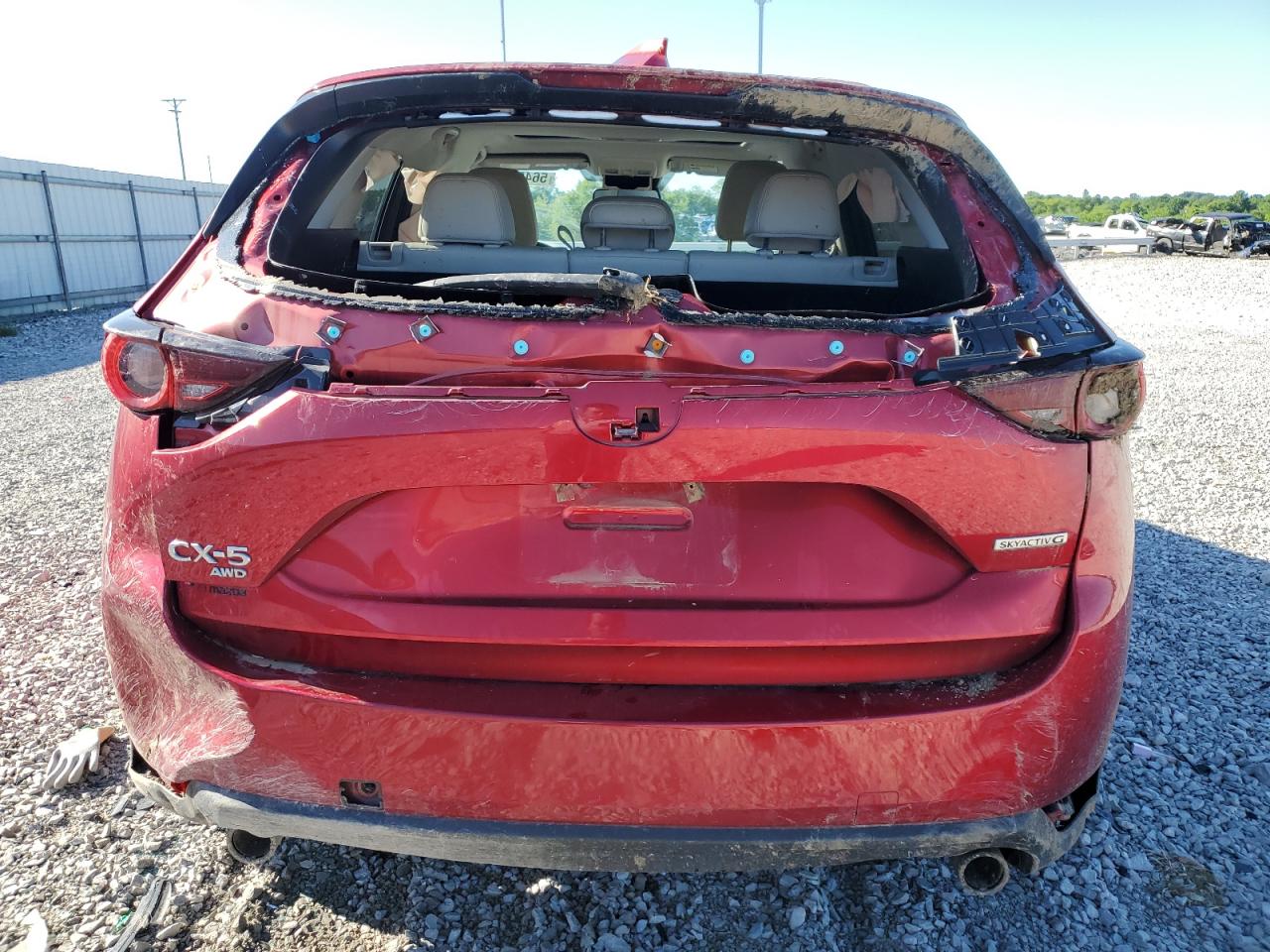 2021 Mazda CX-5 VIN JM3KFBCM4M1489317 Copart auction photo, all over damage thumbnail 6
