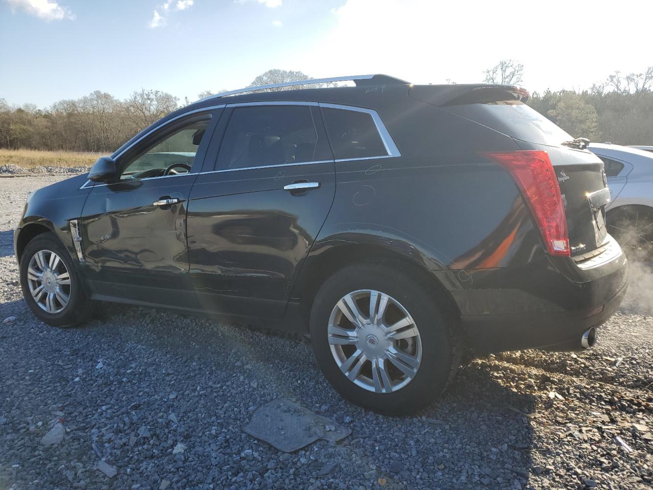 2011 Cadillac SRX VIN 3GYFNAEY1BS668671 Copart auction photo, side / front end damage thumbnail 2