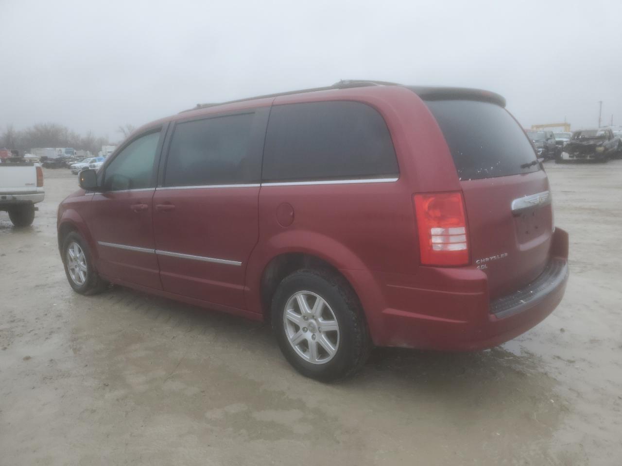 2010 Chrysler Town & Country VIN 2A4RR8DX2AR374940 Copart auction photo, side / front end damage thumbnail 2