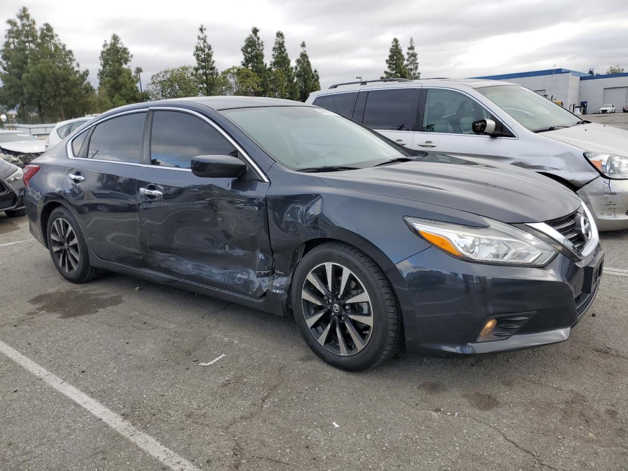 2018 Nissan Altima VIN 1N4AL3AP5JC178811 Copart auction photo, side damage thumbnail 4