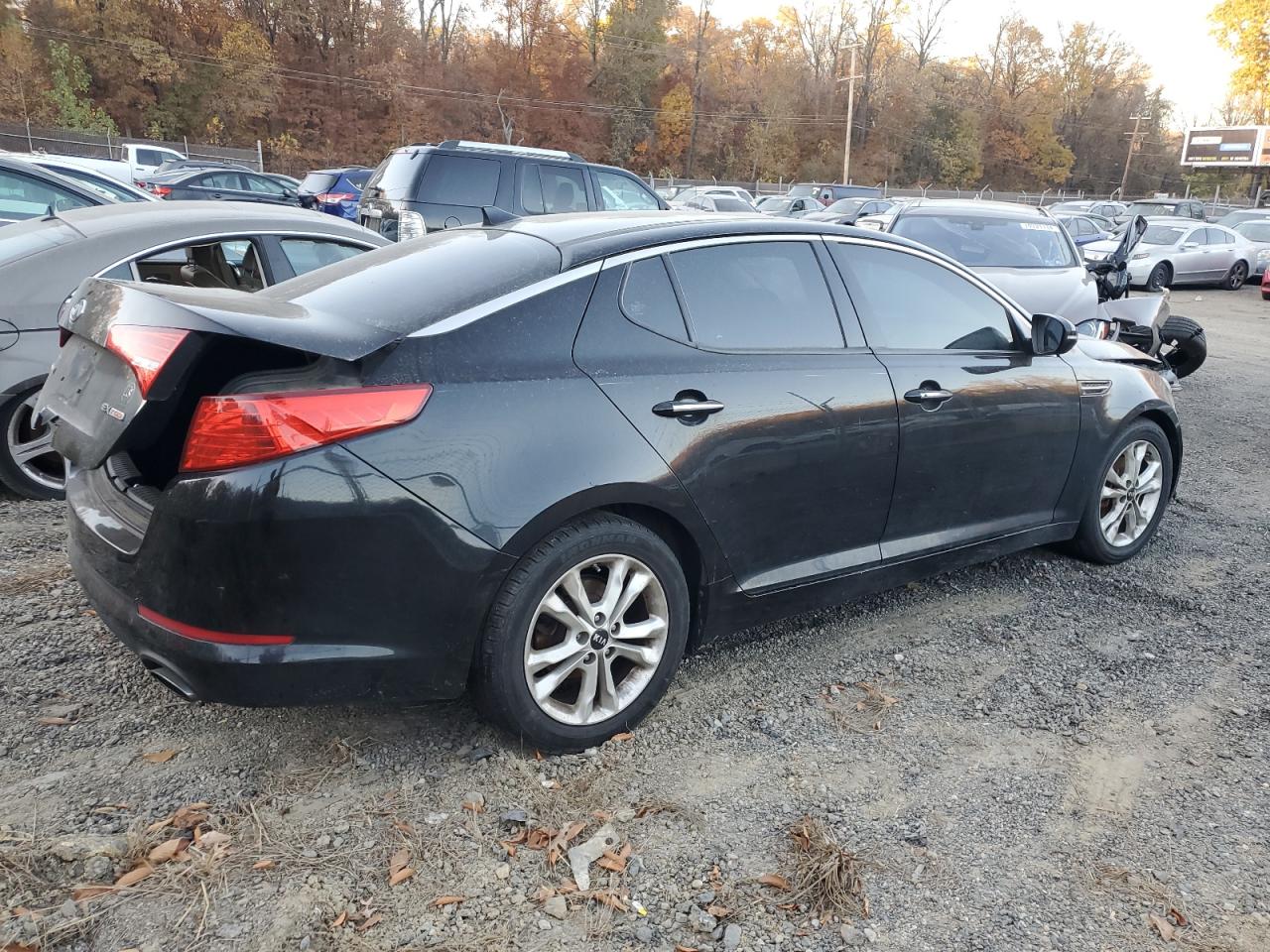2011 KIA Optima VIN KNAGN4A66B5157383 Copart auction photo, burn - engine damage thumbnail 3