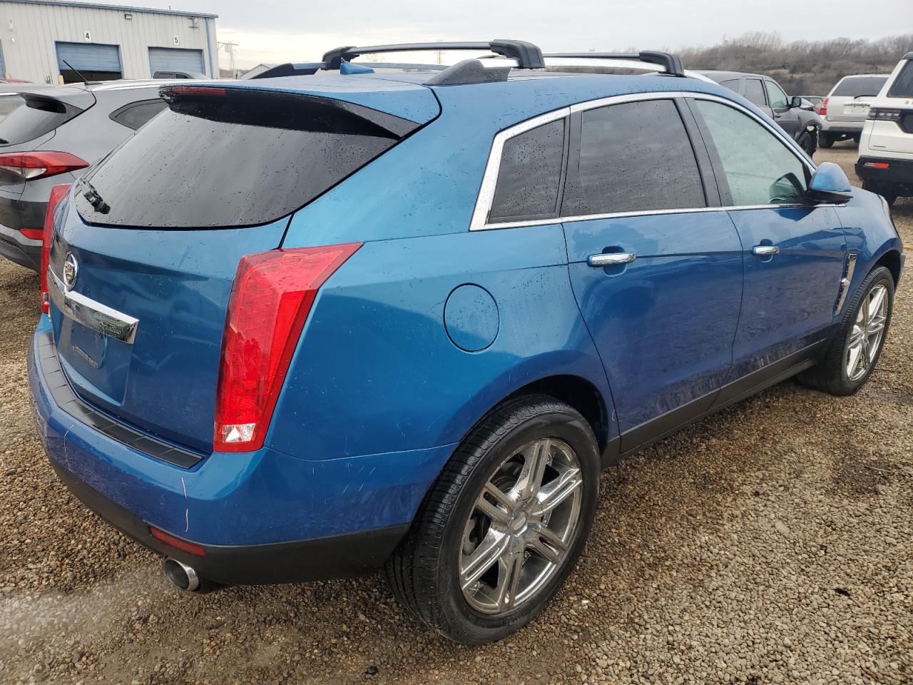 2010 Cadillac SRX VIN 3GYFNAEY8AS568839 Copart auction photo, front end damage thumbnail 3