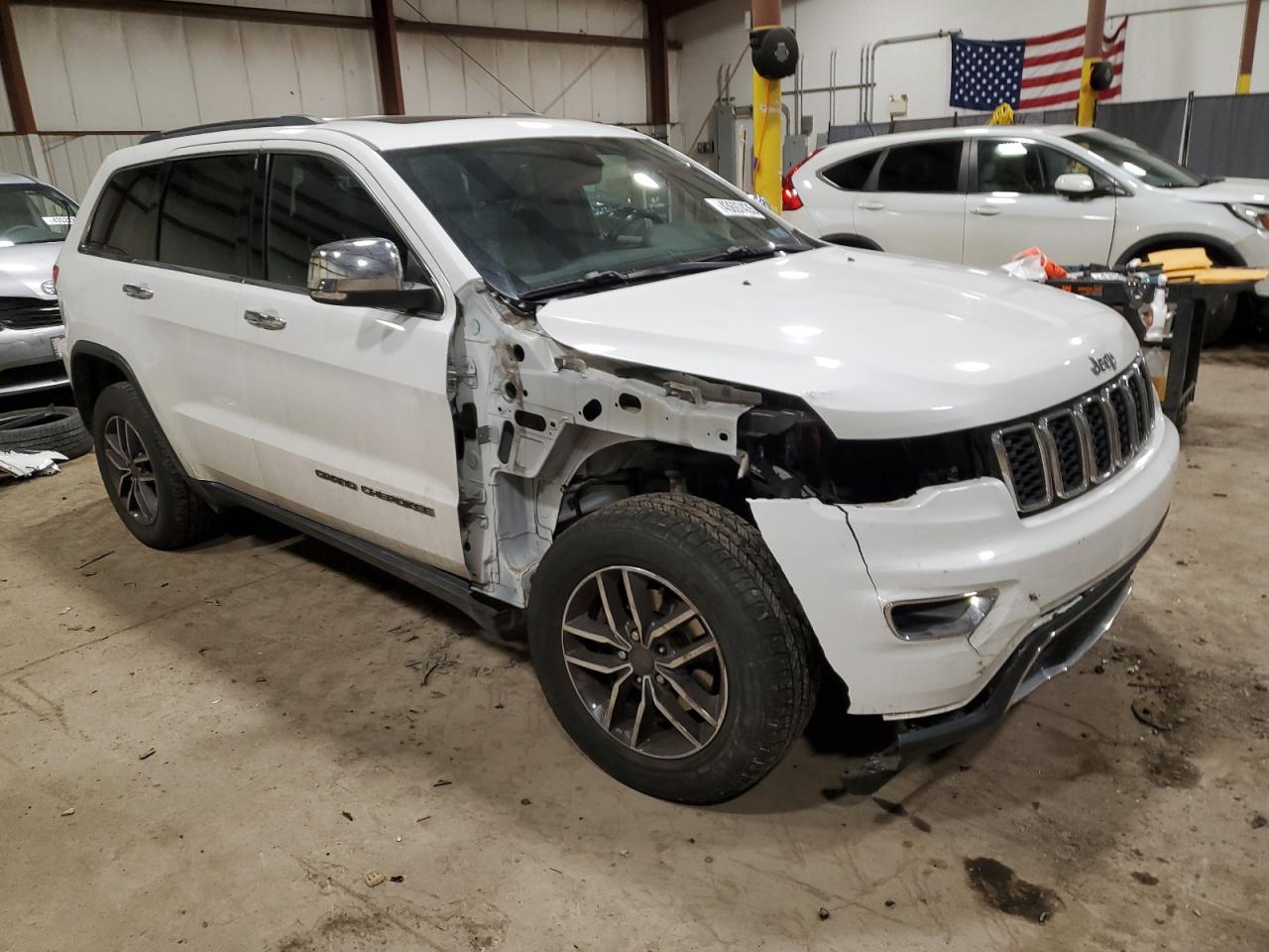 2019 Jeep Grand Cherokee VIN 1C4RJFBG8KC539291 Copart auction photo, front end / side damage thumbnail 4