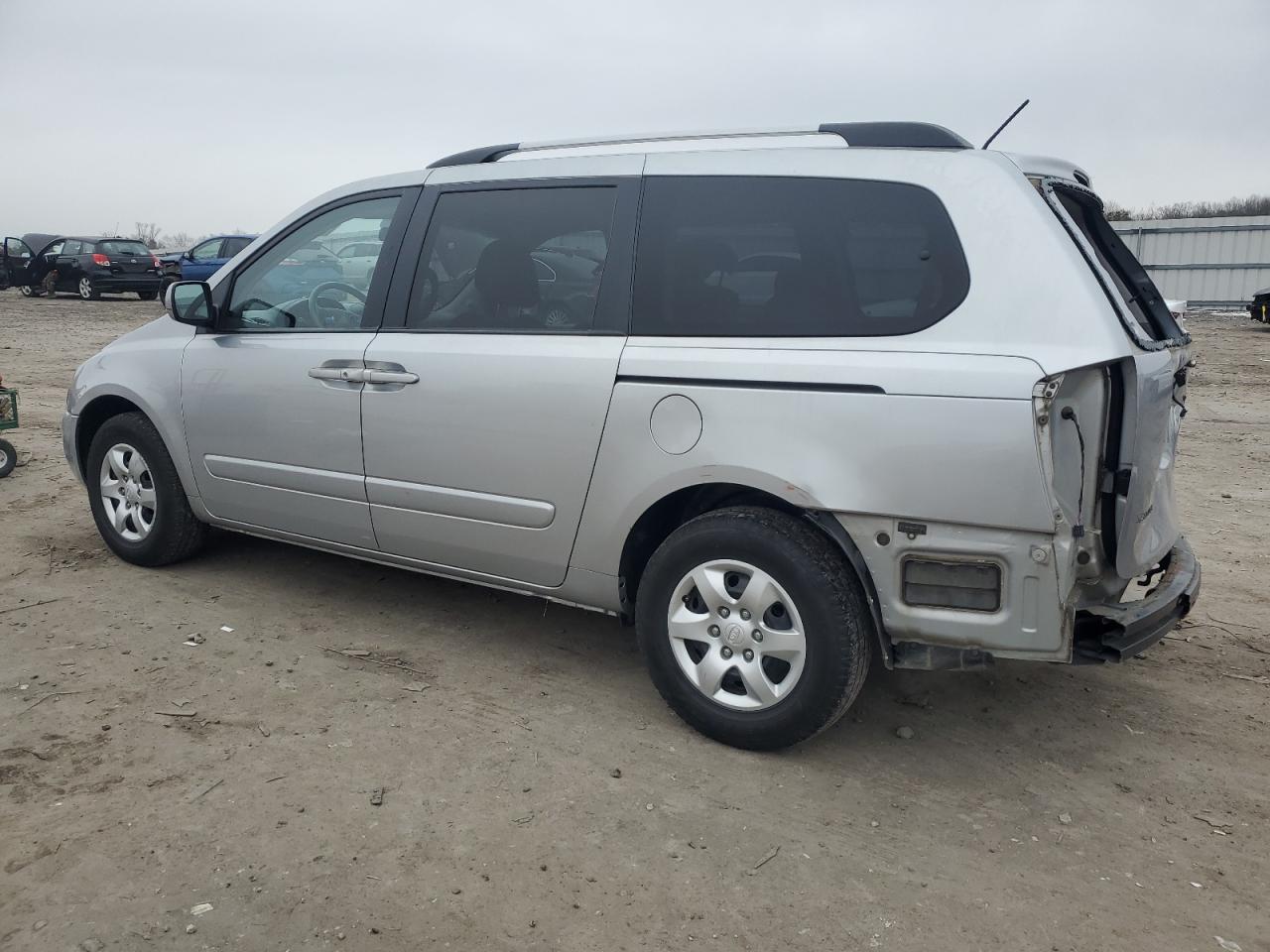 2010 KIA Sedona VIN KNDMG4C30A6343349 Copart auction photo, rear end / minor dent/scratches damage thumbnail 2