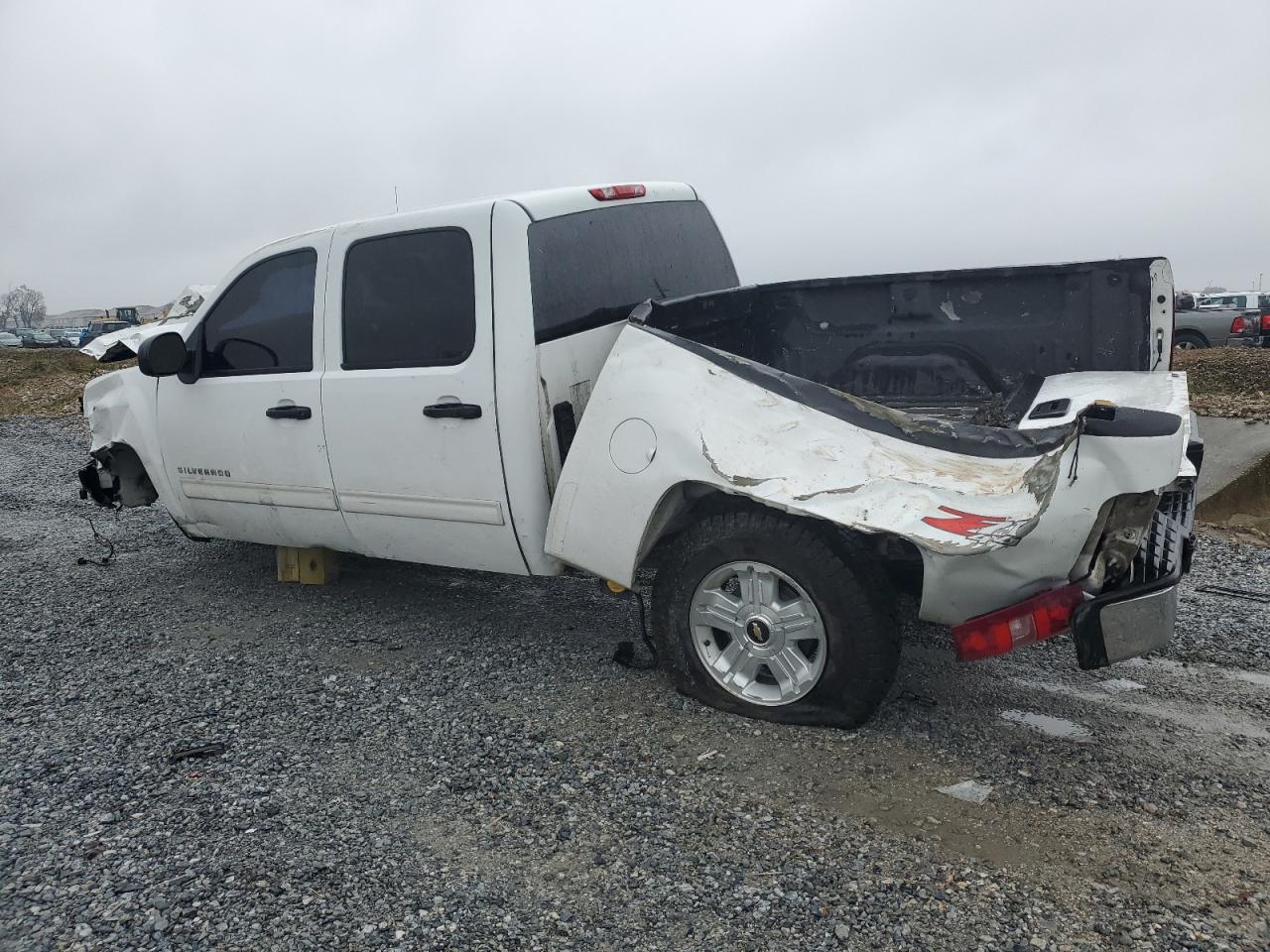 2012 Chevrolet Silverado VIN 3GCPKSE79CG100124 Copart auction photo, front end / rear end damage thumbnail 2