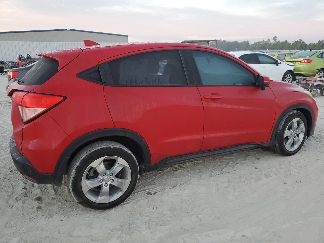 2016 Honda HR-V VIN 3CZRU5H56GM721241 Copart auction photo, side / front end damage thumbnail 3