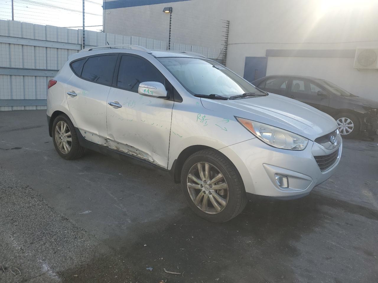 2013 Hyundai Tucson VIN KM8JU3AC0DU658186 Copart auction photo, side damage thumbnail 4