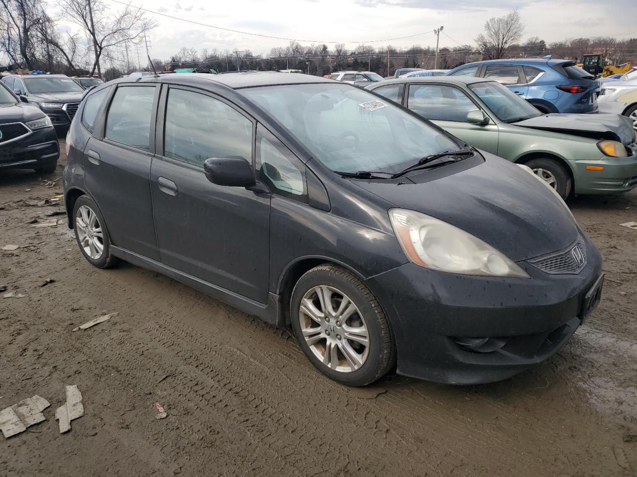 2010 Honda Fit VIN JHMGE8H48AC002809 Copart auction photo, water/flood / all over damage thumbnail 4