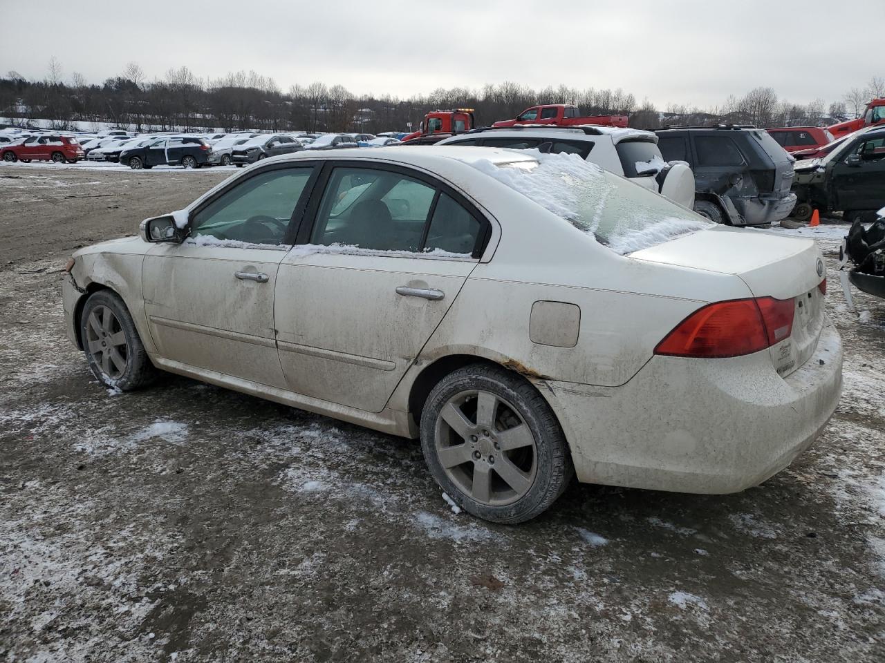 2009 KIA Optima VIN KNAGE224095352407 Copart auction photo, side / front end damage thumbnail 2