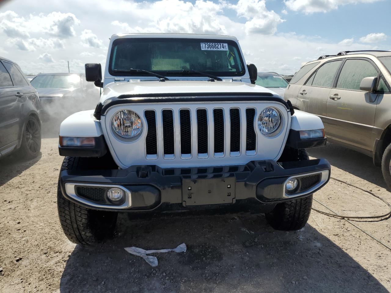 2021 Jeep Wrangler VIN 1C4HJXEG6MW528692 Copart auction photo, water/flood damage thumbnail 5