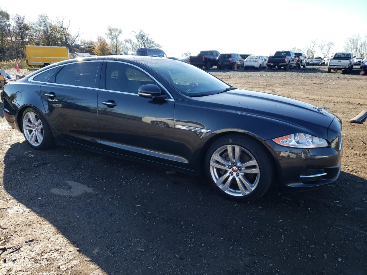 2015 Jaguar XJ VIN SAJWJ2GD1F8V77420 Copart auction photo, undercarriage / rear end damage thumbnail 4