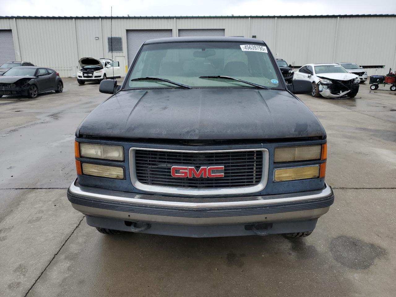 1998 GMC Sierra VIN 2GTEK19R2W1530619 Copart auction photo, rear end damage thumbnail 5