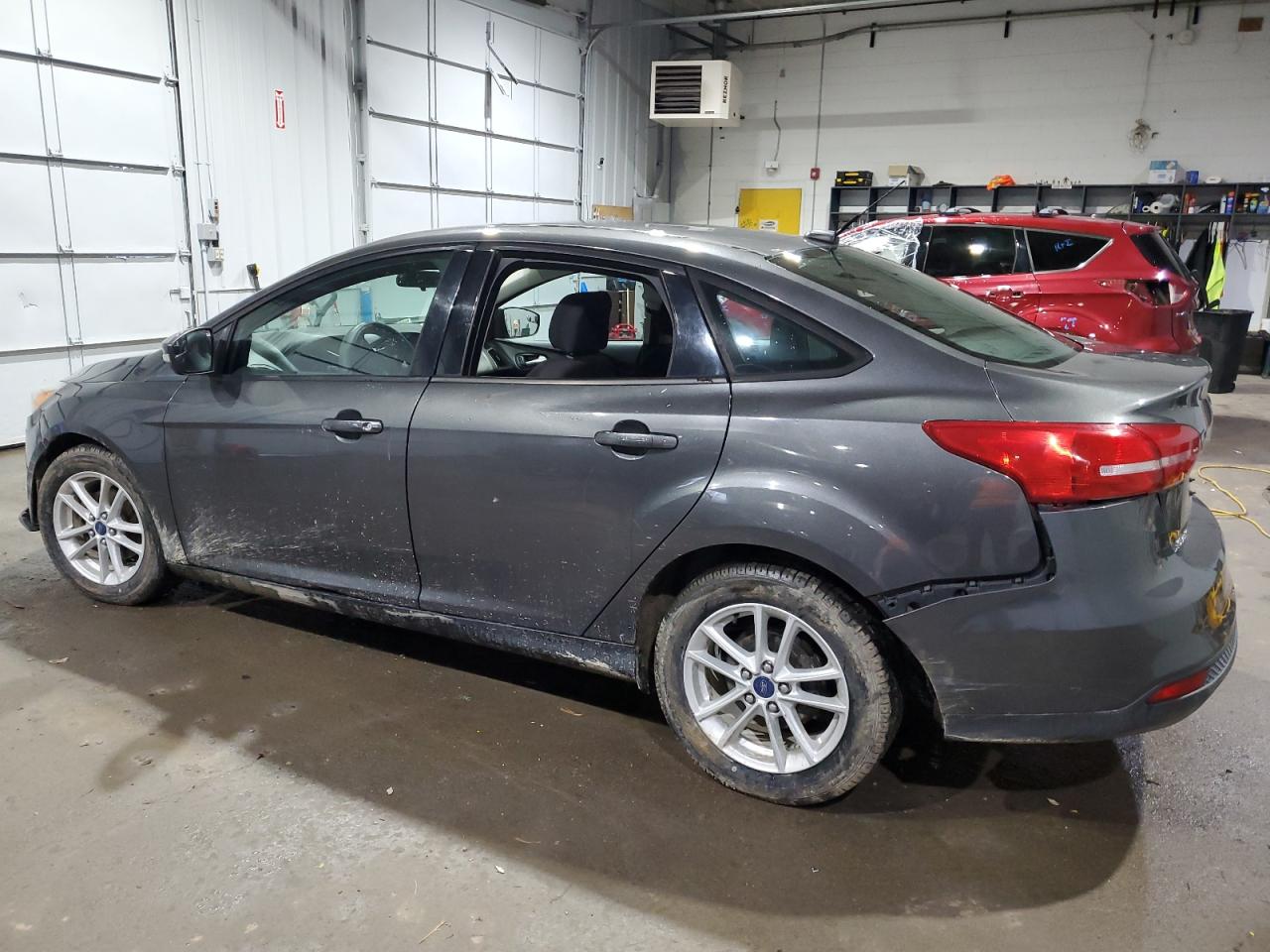 2015 Ford Focus VIN 1FADP3F28FL234004 Copart auction photo, all over damage thumbnail 2
