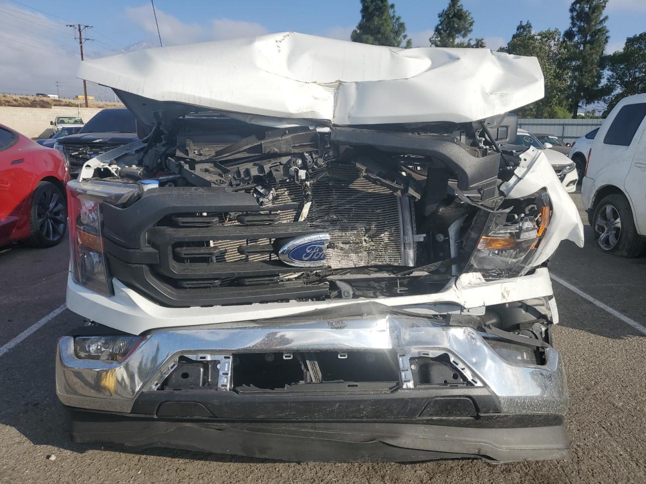 2023 Ford F-150 VIN 1FTMF1C57PKF60674 Copart auction photo, front end damage thumbnail 5