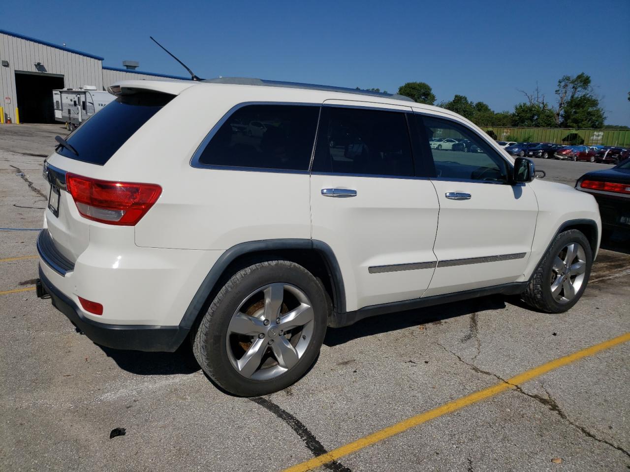 2012 Jeep Grand Cherokee VIN 1C4RJFCT2CC214746 Copart auction photo, hail damage thumbnail 3