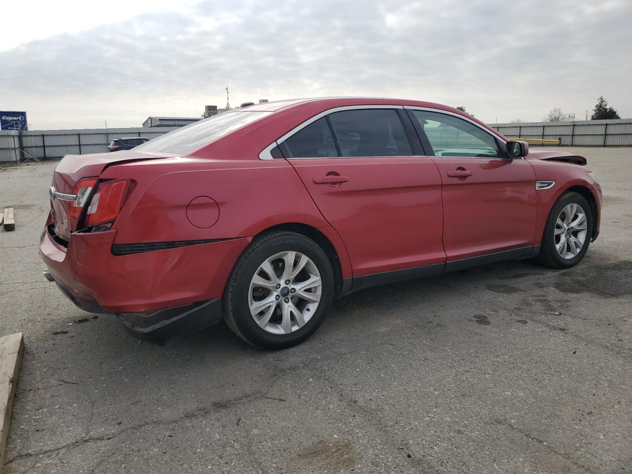 2010 Ford Taurus VIN 1FAHP2EW9AG170556 Copart auction photo, front end / rear end damage thumbnail 3