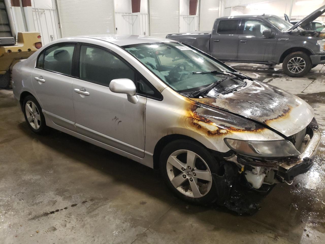 2011 Honda Civic VIN 19XFA1F66BE042305 Copart auction photo, burn - engine damage thumbnail 4