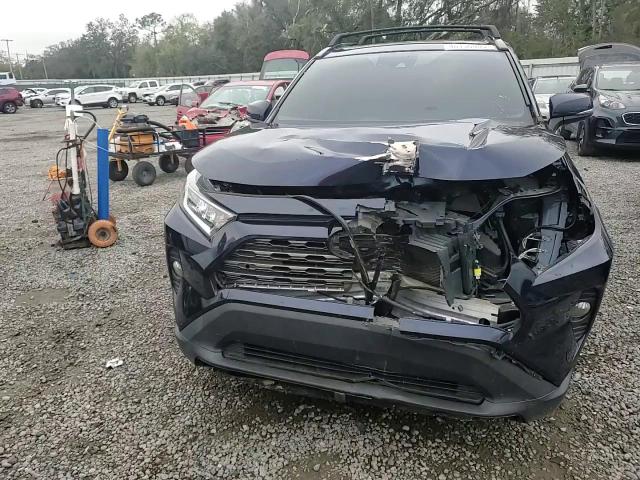 2019 Toyota RAV 4 VIN 2T3Y1RFV4KW049823 Copart auction photo, front end / side damage thumbnail 12