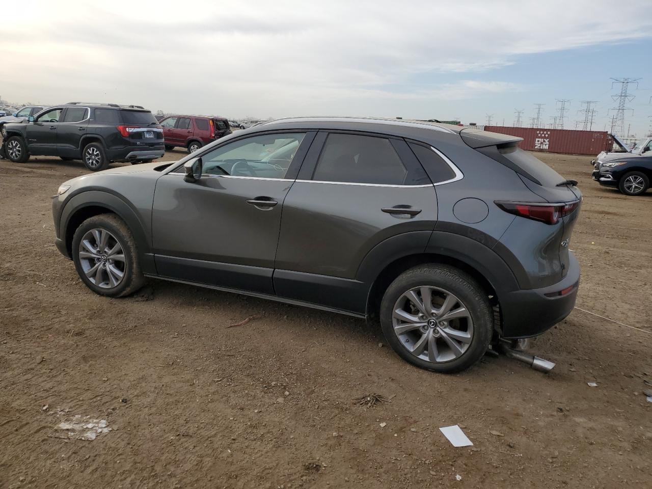 2023 Mazda CX-30 VIN 3MVDMBBM2PM582562 Copart auction photo, side / undercarriage damage thumbnail 2