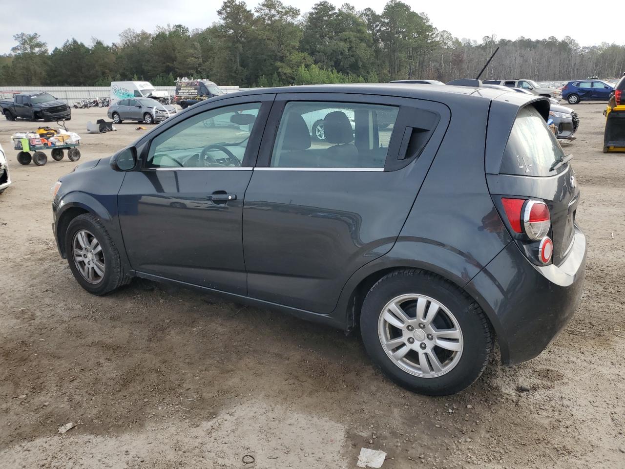 2015 Chevrolet Sonic VIN 1G1JC6SG5F4192812 Copart auction photo, side / rear end damage thumbnail 2