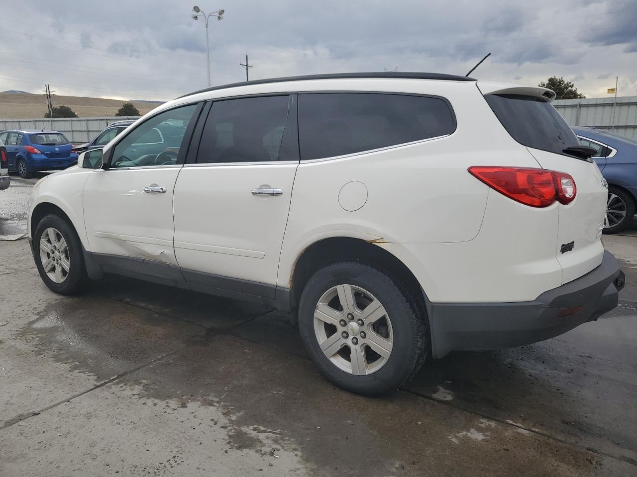 2011 Chevrolet Traverse VIN 1GNKRGED6BJ179541 Copart auction photo, side / hail damage thumbnail 2