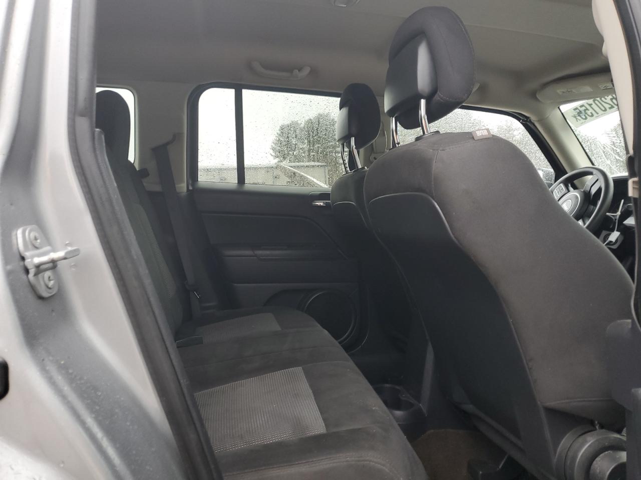 2015 Jeep Liberty (Patriot) VIN 1C4NJRBB1FD239225 Copart auction photo, front end / minor dent/scratches damage thumbnail 11