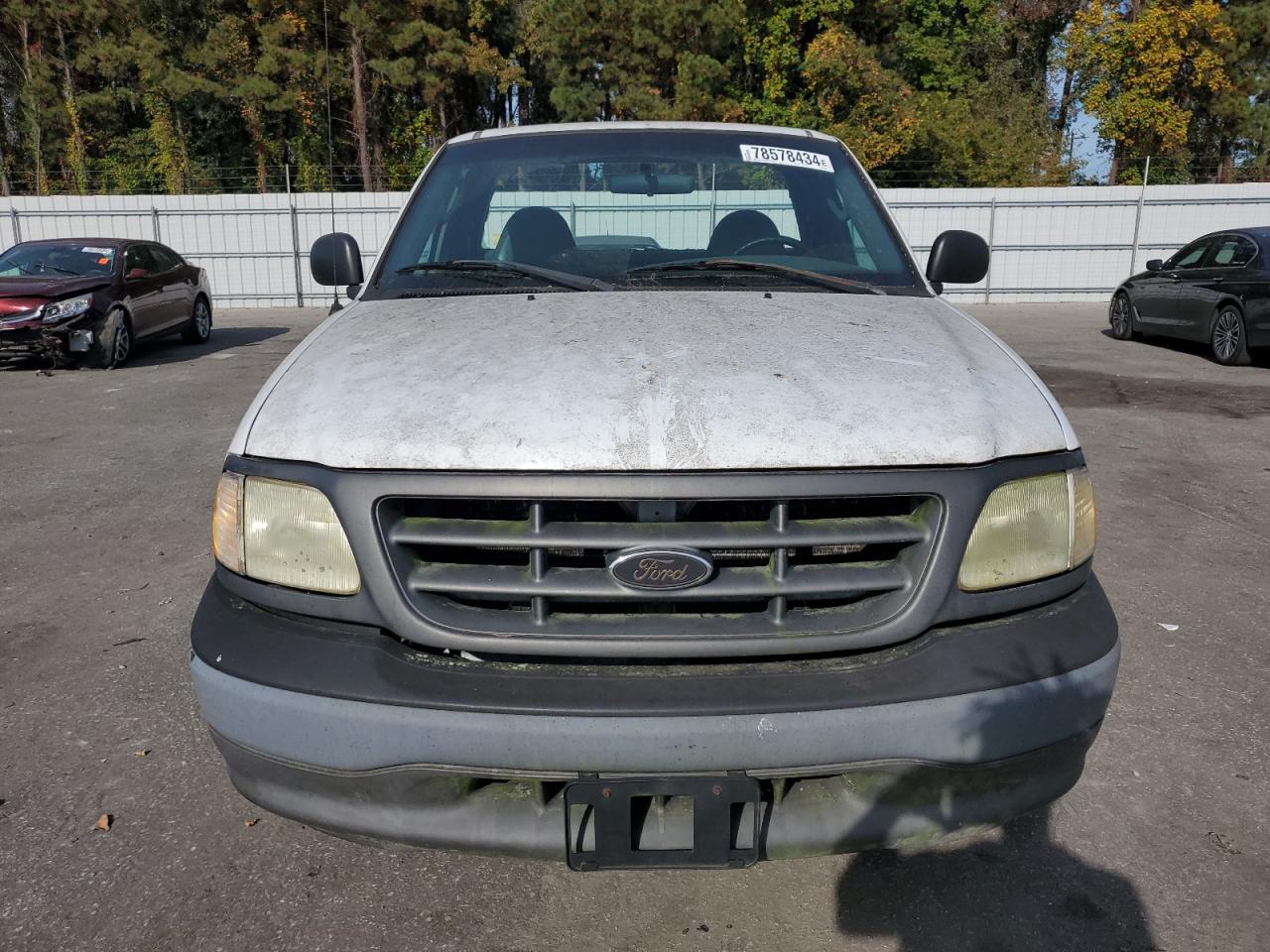 2003 Ford F-150 VIN 1FTRF17W03NA39409 Copart auction photo, rear end damage thumbnail 5