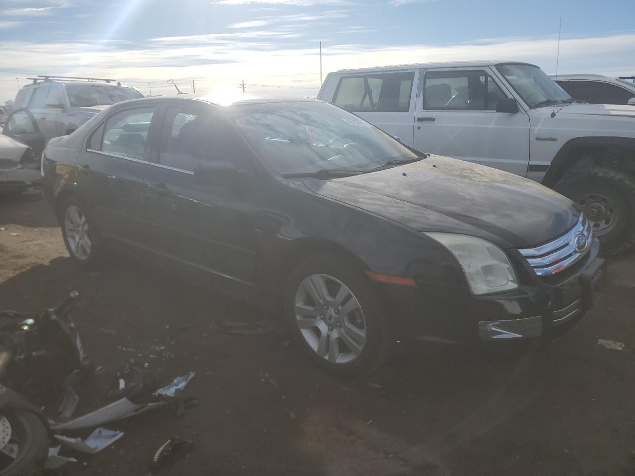 2009 Ford Fusion VIN 3FAHP08149R109270 Copart auction photo, side / front end damage thumbnail 4