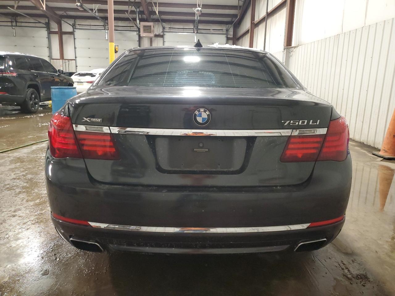 2013 BMW 7er VIN WBAYF8C54DD140880 Copart auction photo, side / front end damage thumbnail 6