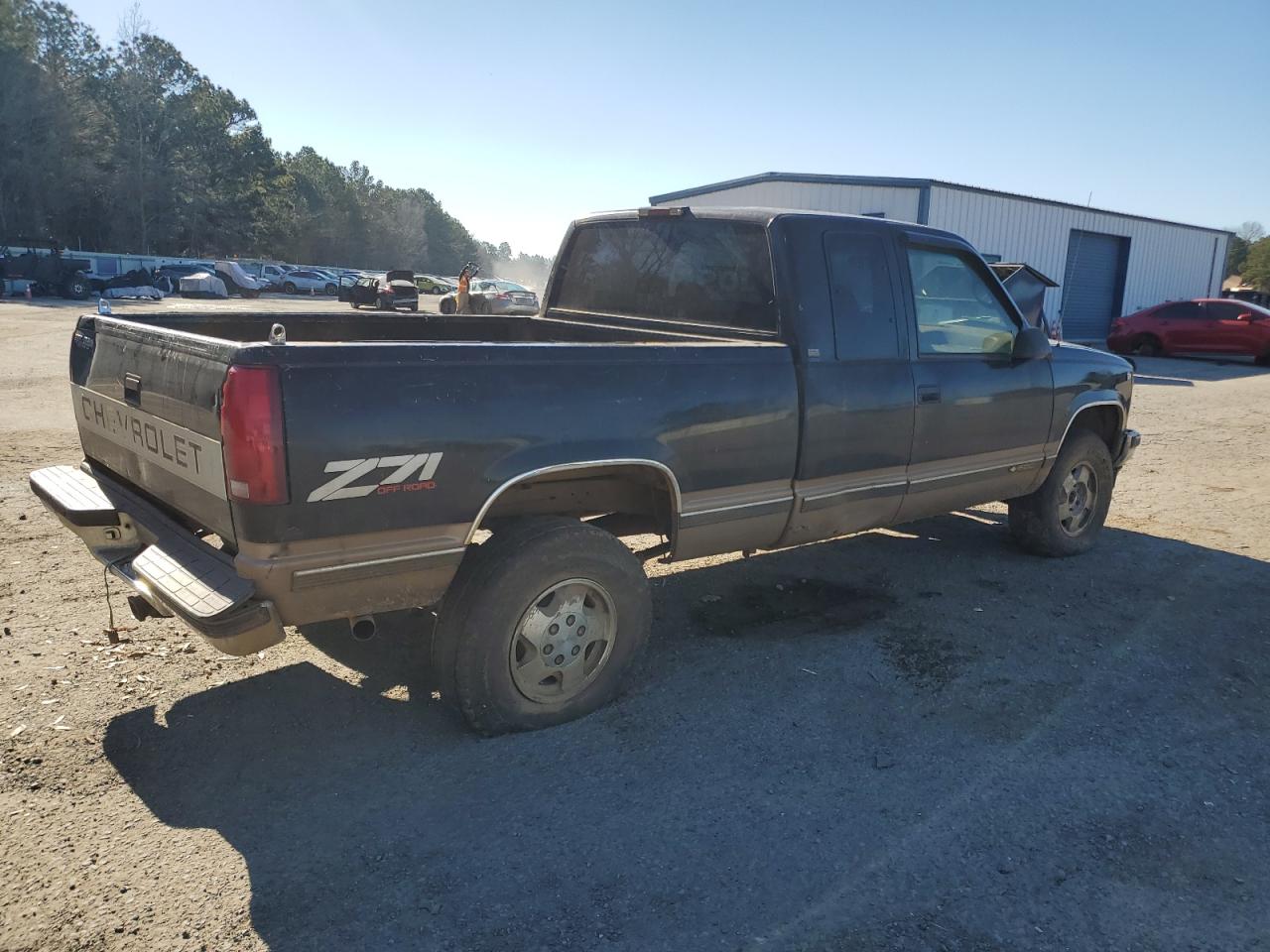 1995 Chevrolet GMT-400 VIN 2GCEK19K2S1291019 Copart auction photo, rear end / minor dent/scratches damage thumbnail 3