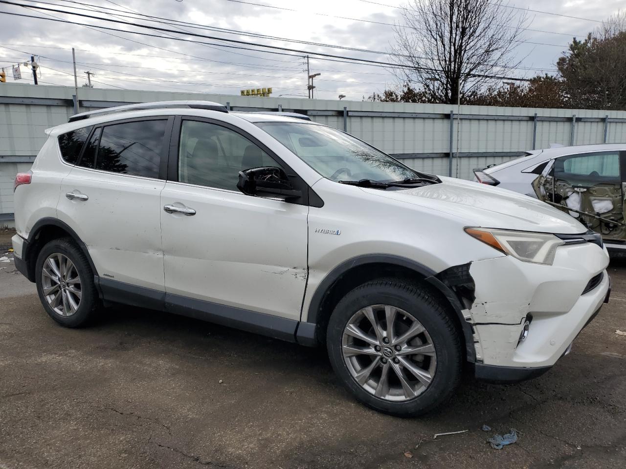 2016 Toyota RAV 4 VIN JTMDJREV8GD003464 Copart auction photo, all over damage thumbnail 4