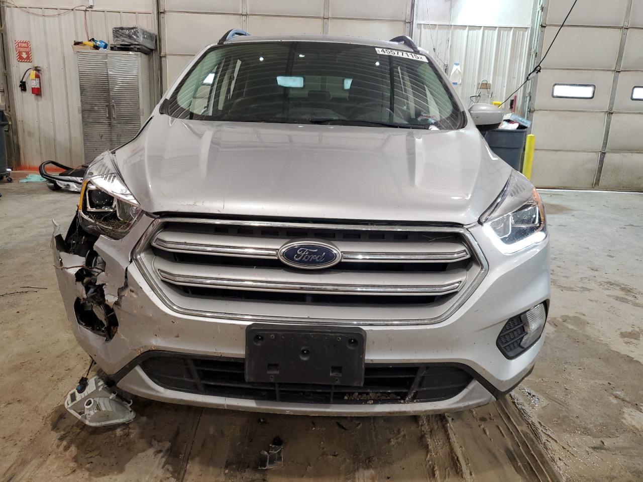 2019 Ford Escape VIN 1FMCU9HD7KUA70034 Copart auction photo, side / front end damage thumbnail 5