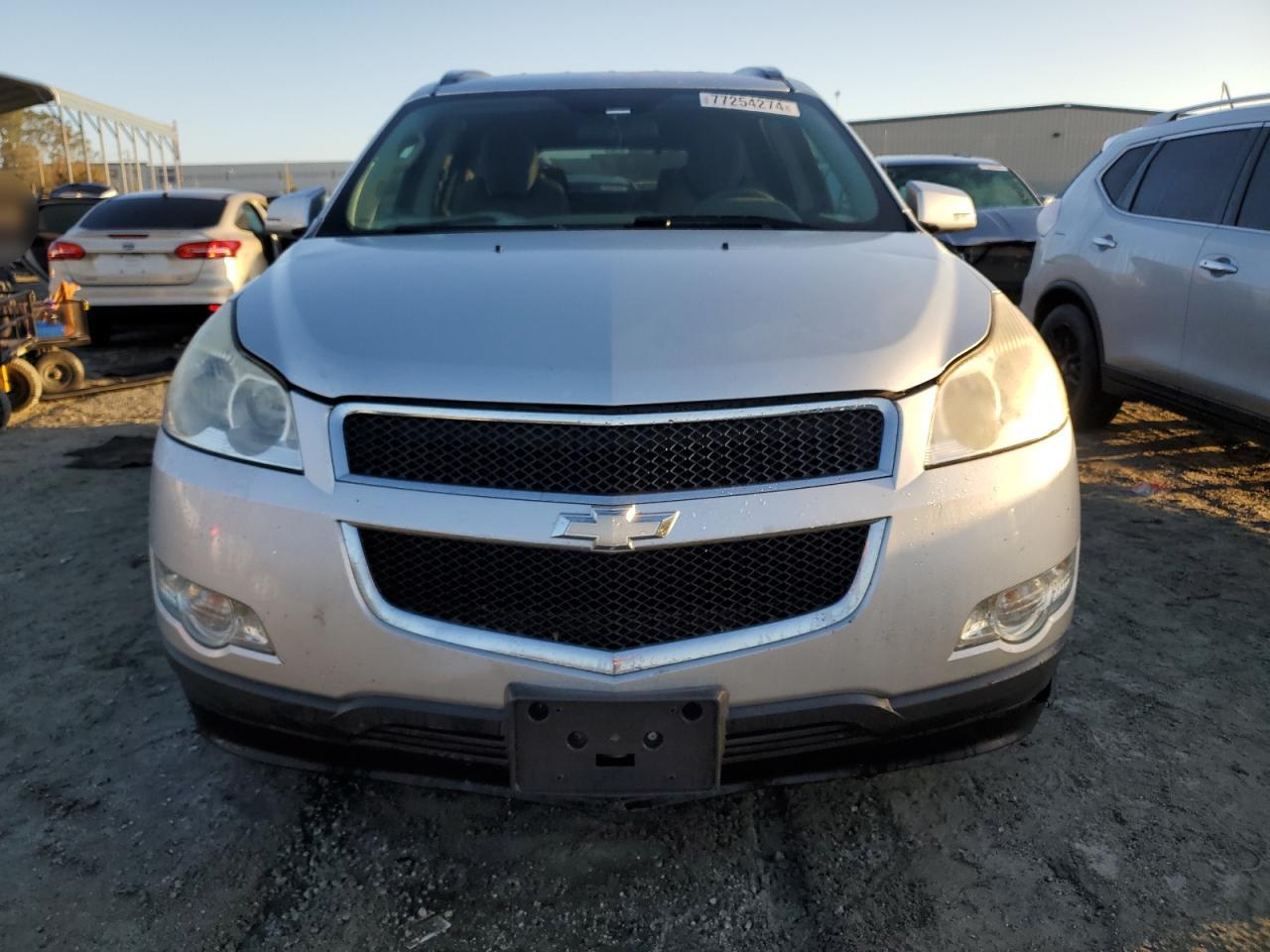 2010 Chevrolet Traverse VIN 1GNLVFED0AJ204362 Copart auction photo, side damage thumbnail 5